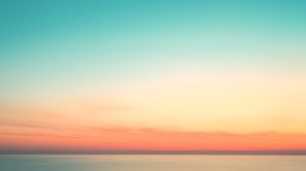 Fototapeta premium Serene sunset over calm reflective waters with vibrant gradients of turquoise, pink, orange, and yellow creating a harmonious scene