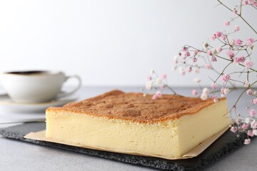 Tasty Japanese Castella sponge cake served on light table, closeup. Space for text