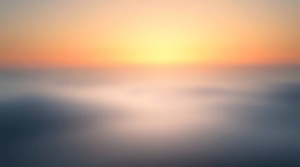 Blurry sunrise over hazy mountains