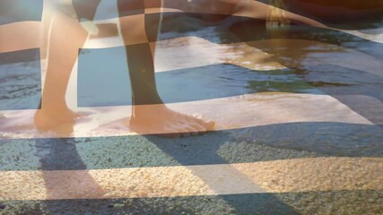 Walking through water, feet with Greek flag overlay in animation - Powered by Adobe