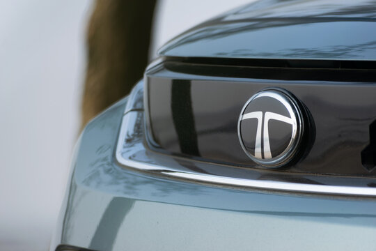 Picture of logo of Tata motors. Dealership, sales, festive offers, discount, mahindra, maruti, hyundai, competitors, demerger, wheels, colour, metallic, suv, safety.