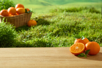 The light-grained wooden floor has fresh oranges with intact stems and rough skin. Orange segment...