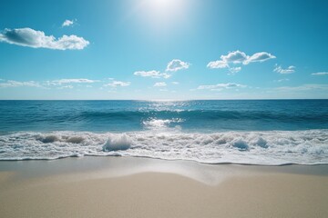 Sunny tropical beach with soft waves and golden sand under blue sky