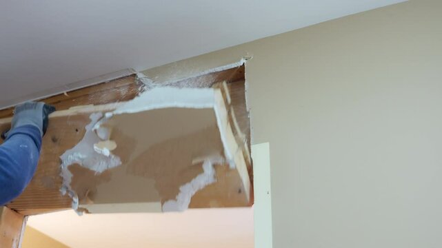 Construction process of Demolition of a wall in apartment in house. 