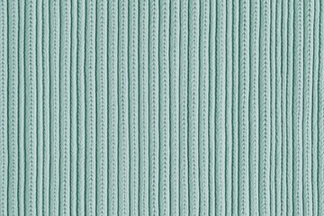 Light green knitted fabric texture background, soft wool textile, fiber material pattern