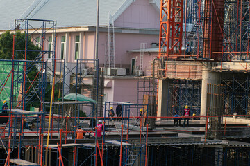 City building foundation structure construction site with crane high rise