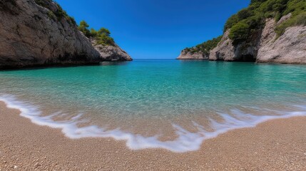 Picturesque cove with turquoise water and sandy beach