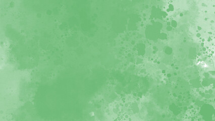 Textured green watercolor wash with subtle splatters. Abstract background with organic, hand-painted feel. Soft and calming color palette.