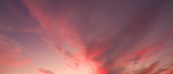 Panoramic high-resolution sky background with red clouds