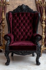 Elegant burgundy velvet throne chair with ornate black wood frame.