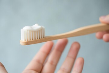 Eco-friendly bamboo toothbrush in serene natural setting close-up view
