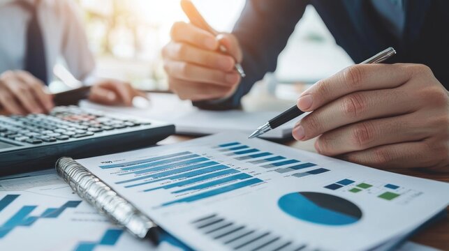 A bank manager providing advice on financial services to a client in a meeting.