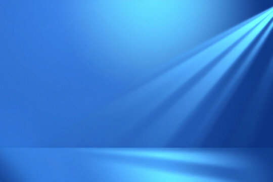 Bright blue background with light beams shining diagonally from the top right, creating a stage spotlight effect illuminating the space.