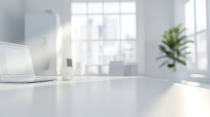 Minimalist workspace featuring a laptop and mouse on a white desk with a bright, airy background.