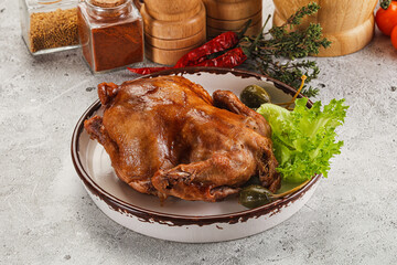 Baked small chicken with spices