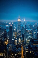 Fototapeta premium arafed view of a city at night with a lot of lights