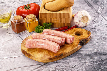 Raw meat sausages for grill