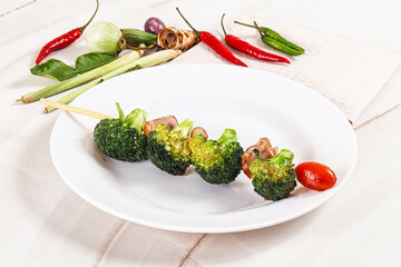 Thai Street foof satay with bacon and broccoli