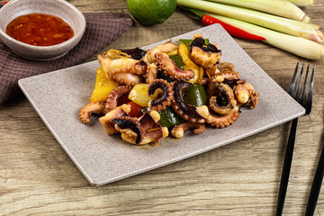Roasted octopus with vegetables and oil