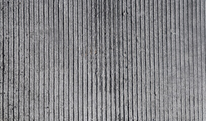 Textured cement road surface, with parallel grooves