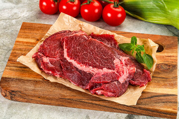 Raw beef cheeks cut for cooking
