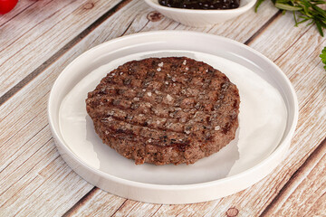 Grilled juicy beef cutlet for burger