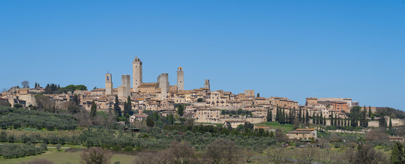 Obraz premium San Gimignano, Italy. Amazing view of the wonderful village of San Gimignano known as the Town of Five Towers. An Unesco World Heritage. Tuscany, Italy. 