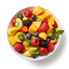 Obraz premium Fresh fruit salad bowl kitchen table food photography bright lighting top-down view healthy eating