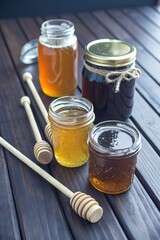 Jars of Honey and Wooden Stick Sweet and Natural Food Illustrations for Creative Designs