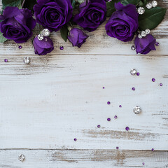 flat lay of purple roses and tiny diamonds on a rustic white wooden surface