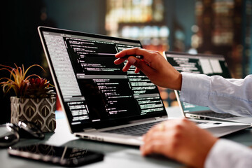African American Coder Using Computer At Desk