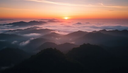 Obraz premium Majestic Sunrise Over Foggy Mountain Ranges, Breathtaking Panoramic View