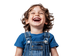 A toddler with curly brown hair laughs heartily while wearing a blue t-shirt and denim overalls against a transparent background, concept for children's clothing advertisement, joy, happiness