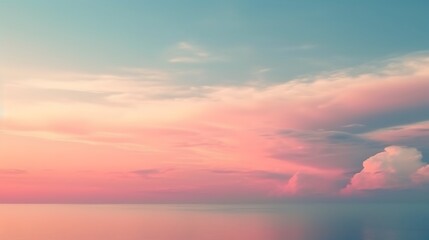Fototapeta premium Serene Pink Sunset Over Calm Ocean Waters