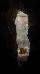 Discovering a Hidden Chapel Through a Cave Opening