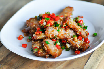 stir fried pork or deep fried pork , fried pork or crispy pork