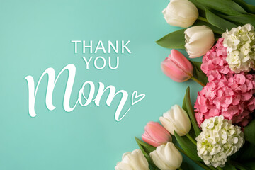Thank You Mom Floral Arrangement with Tulips and Hyacinths on Soft Teal Background