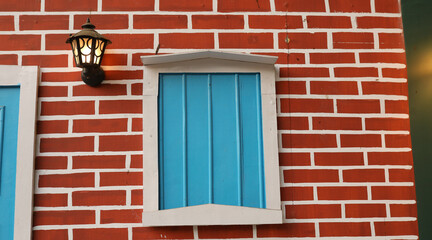 window on a brick wall