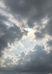 A break in the clouds reveals a bright, sunny sky, illuminating the day ahead.