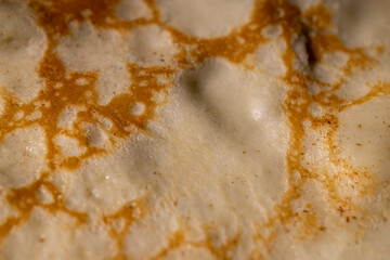 making pancakes from milk and flour with eggs