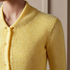 close up of a woman in a knitting  jacket