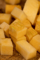 diced soft ripe pumpkin of orange color, fresh pumpkin for cooking