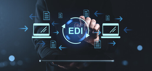 Electronic data interchange concept with digital icons and tablet.