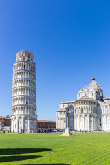 Historic leaning tower and the Duomo cathedral in Pisa, Italy