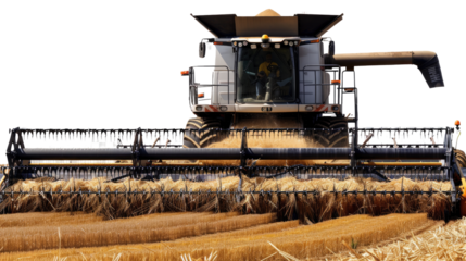 Golden Harvest: A massive combine harvester methodically cuts through fields of ripe wheat, showcasing agricultural technology and the process of food production.