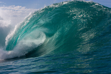 Dramatic Wave Curling in the Ocean
A breathtaking shot of a massive turquoise wave curling over,...