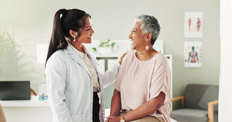 Clinic, doctor and check up with mature woman, discussion and healthcare, service and consultation. Hospital, caregiver and person with patient in office, test and support of medical professional