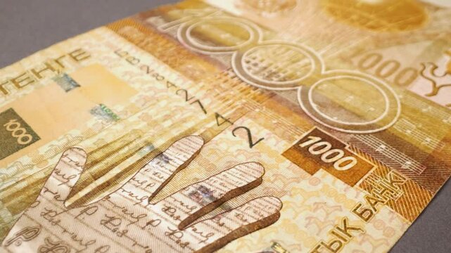 1000 Kazakhstani tenge banknote. Close-up with slider movement.