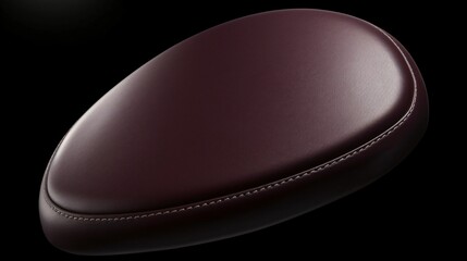 Luxurious Burgundy Leather Seat Cushion - Close-up Studio Shot