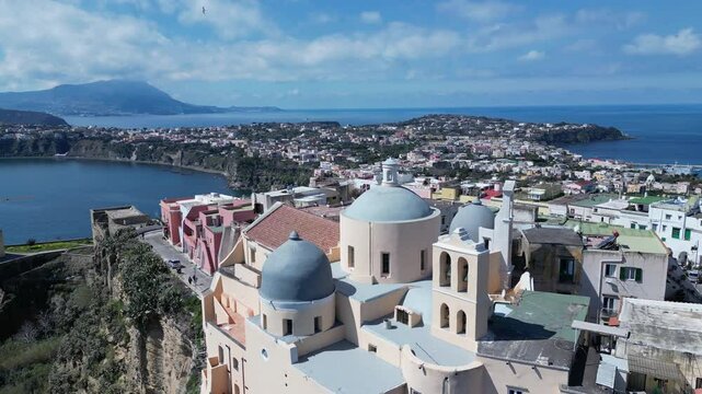 Italy historic landmarks and travel destinations, drone flight over dome of church (Abbazia di San Michele Arcangelo) on Procida island
